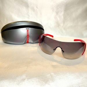 PRADA shield sunglasses in red and dark gray